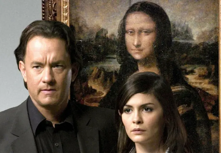 Tom Hanks i Audrey Tautou, główni aktorzy z filmu Kod da Vinci, pozują przed obrazem Mona Lisa.